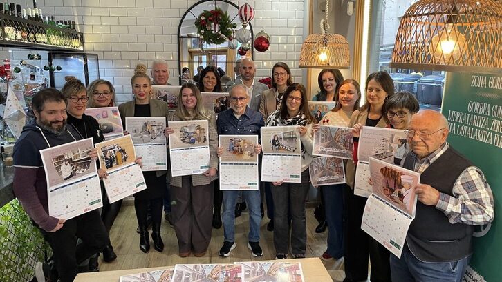 Gorbea inguruko merkatariak, egutegi berriarekin.